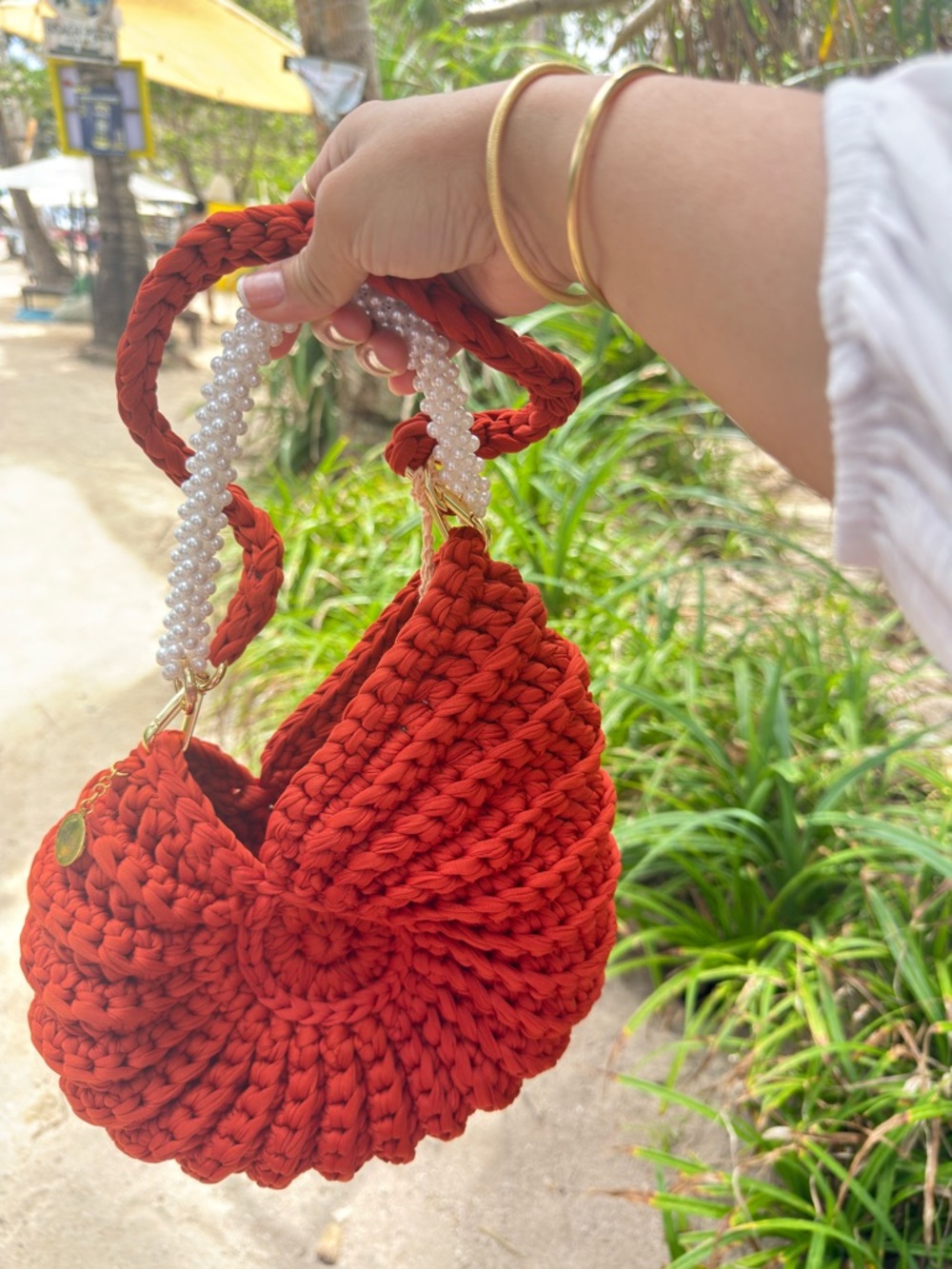 Handcrafted Red Crochet Shoulder Bag with Pearl Accent